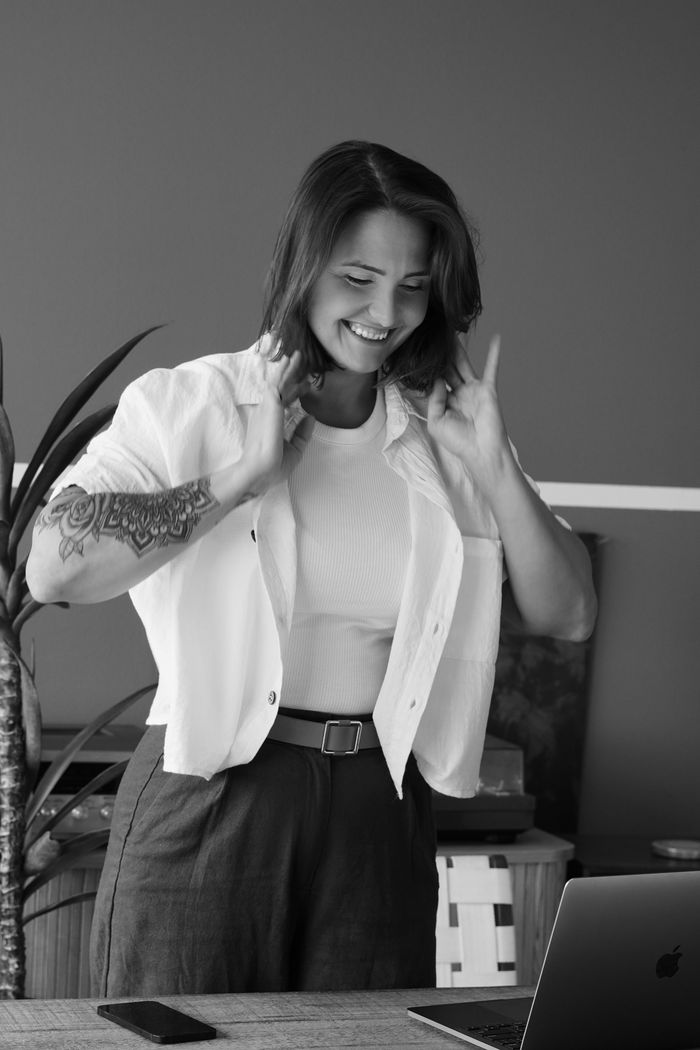 Bec Bennett, founder of Growth Lab Co, laughing at her desk